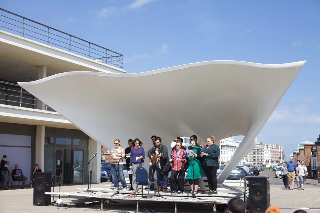 Choir performance on outside stage at the De La Warr